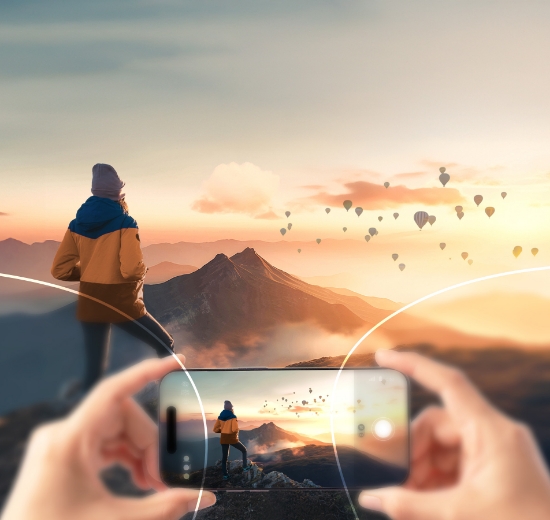 Blick auf Smartphone in der Nähe und auf Bergspitze in der Ferne mit eingezeichneten Sehbereichen eines Gleitsichtglases.